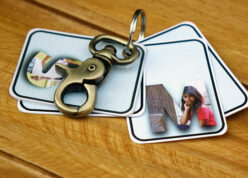 A Vintage key holder to a custom made name letter pictured leaves key chain.