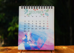 smiling girl's photo on calendar with pink theme