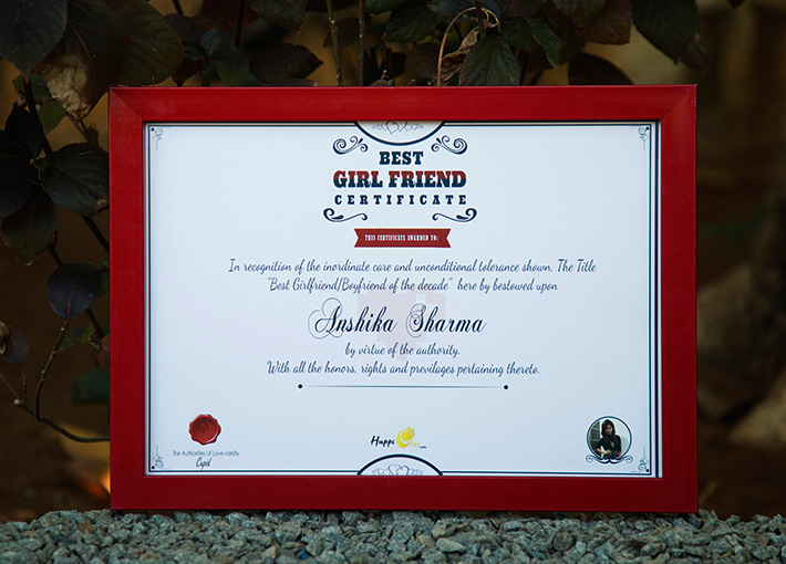 best boyfriend certificate with name and signatures in a red frame placed in small stones