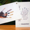 photo clipped into a palm and palmistry printed on thick sheets as greeting card