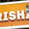 girl sittig on top of her name alphbet edited frame gift with orange background
