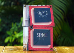 handmade greeting card with colleagues names on front page with handle to open it