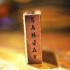Customized name print branding on a side of the pack of cards box