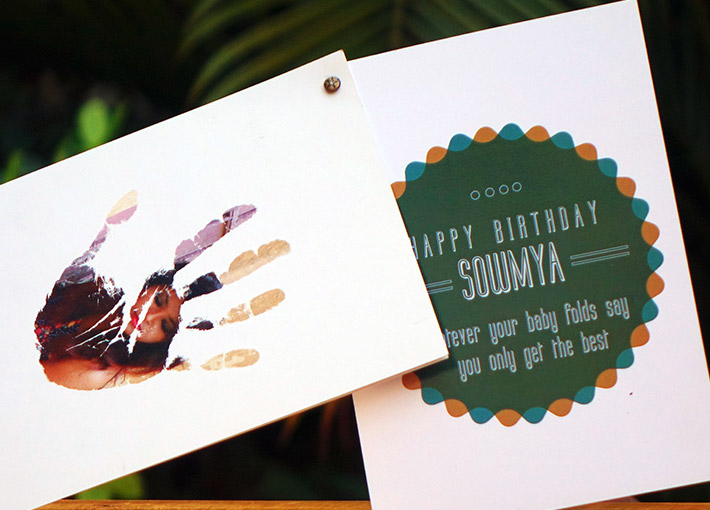 photo inside a handprint and happy birthday card