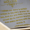 customized letter with name hand drawn on cloudy effect paper inside a wooden box