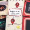 close up view of greeting card with custom message in centre with photos and names to the sides