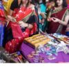 ladies crowded at a bangle making stall arranged in an indian traditional event