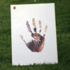 photo clipped on to a palm icon which is printed on a handmade greeting card