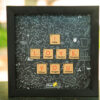 i love you proposal frame with doodles background in a square black frame