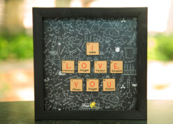 i love you proposal frame with doodles background in a square black frame