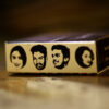 Comic edited faces on one side of abox