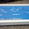 chemically perfect text printed with other chemical elements inside a white a4 frame