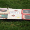 tilted view of handcrafted greeing card with pictures,names and locations