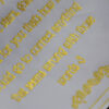 hand drawn custom letter with golden letters on semi transparent paper