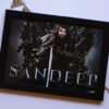 sandeep name and photo edited in old kings style with white background and paper banners