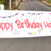 Happy Birthday name celebration starflex surprise banner on road