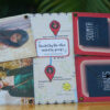 long distance friendship relation greeting card with pictures and names placed on wooden bench