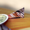 Close view of a side of a 3D star with girl's pictures on it and a wishing quote card at its center.