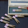 clips with email icon spread on floor along with pine wood box