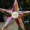 3D star made up of 300 gsm card with a girl's pictures printed over it.