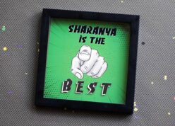 you are the best text in a frame with a finger pointing inside a black square frame with confetti around