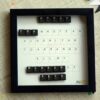 Black square frame with message uniquely formed with key board keys.
