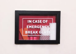 Break in case of emergency box frame with first aid kit in it